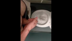 Risky, jerking off and cumming in a public toilet in middle of the day
