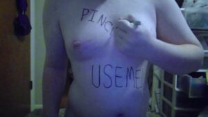 Trans slut writes all over her body