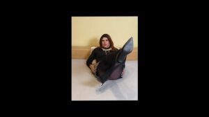 Winter in the garden - dress with black boots and tights